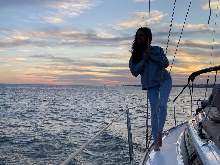 Lisbon: Private Tagus River Sunset Cruise on a Luxury Boat - Sailing beneath the 25 de Abril Bridge