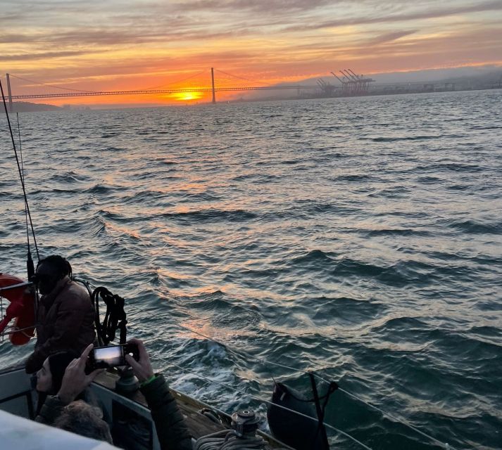 Lisbon: Sailboat Sunset Tour with a Drink - Almada and Christ the King across the water
