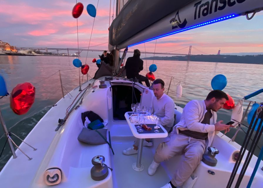 Lisbon: Sailboat Tour w/ Local Guide and Open Bar Green Wine - Meeting the boat beneath the 25 de Abril Bridge