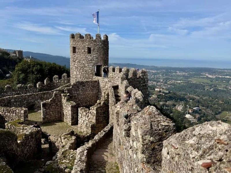 Lisbon: Sintra, Pena Palace, Moorish Castle & Regaleira Tour - Walking, weather, and the pace of the day