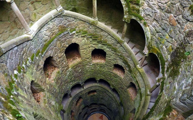 Lisbon: Sintra, Pena Palace, Regaleira & Monserrate Day Trip - Quinta da Regaleira: wells, tunnels, and theatrical gardens