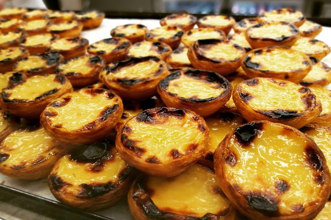 Lisbon Small-Group Food Tour with 18 Tastings in Alfama District - Guides who shape the experience