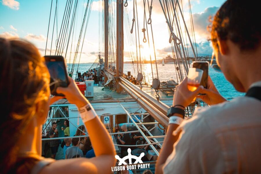 Lisbon: Sunset Boat Party with 2 Drinks and Free Club Entry - The seven hills look best after you leave the dock