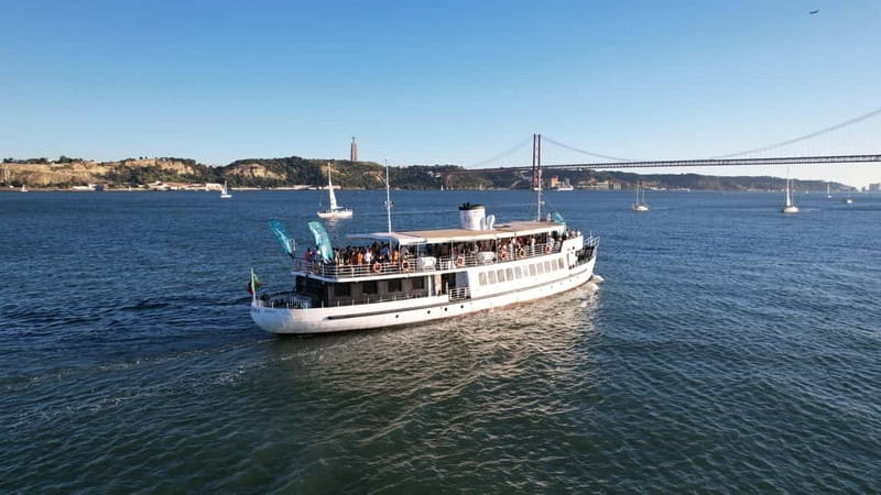Lisbon: Sunset Boat Tour with Music and Drinks - The Evora, a historic boat with a modern party mood