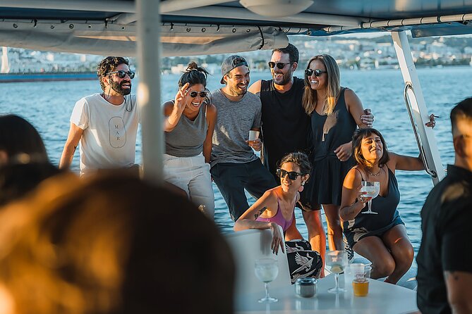 Lisbon: Sunset Catamaran Boat Tour with Music and Drinks - Christ the King and the 25 de Abril Bridge