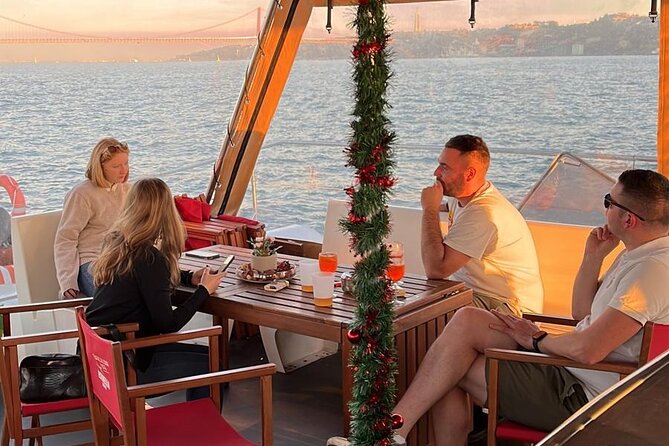 Lisbon: Sunset Catamaran Boat Tour with Music and Drinks - Music, drinks, and the mood on board