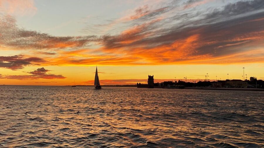 Lisbon: Sunset Cruise with Drinks and Snacks - Passing beneath the 25 de Abril Bridge