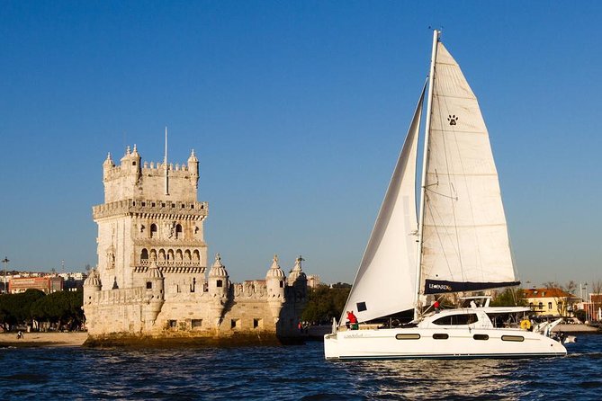 Lisbon: Sunset Cruise With Drinks on Spacious Yacht - Boarding Beneath the 25 de Abril Bridge