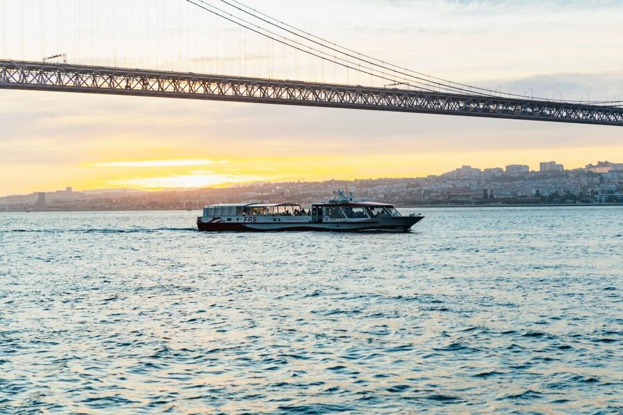 Lisbon: Sunset Cruise with Welcome Drink and Snacks - Under the 25 April Bridge