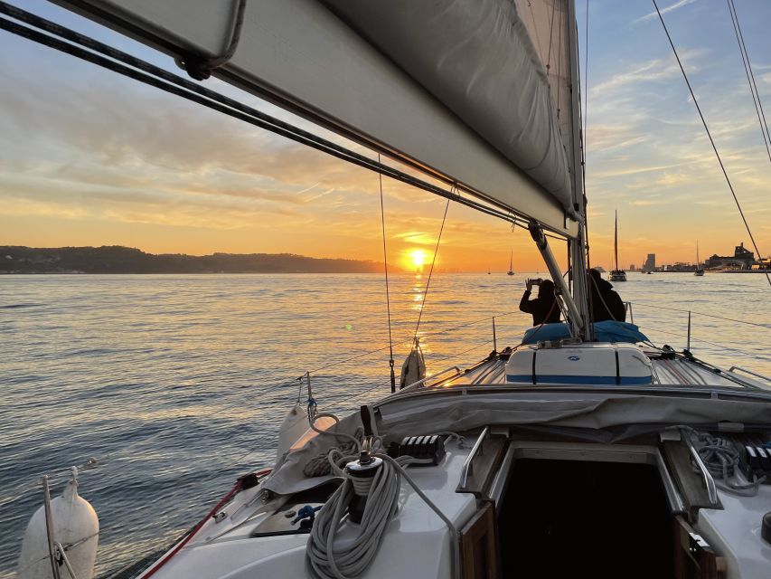Lisbon: Sunset Sailing Boat Cruise with Wine - Wine, guides, and the pace on board