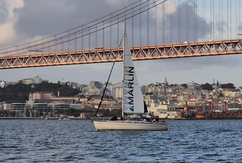 Lisbon: Sunset Sailing Boat Tour with Drinks - MAAT, the Electricity Museum, and the western waterfront