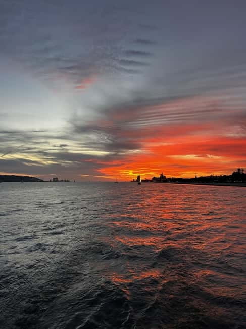 Lisbon: Sunset Sailing Boat Tour with Drinks - What $34 buys you