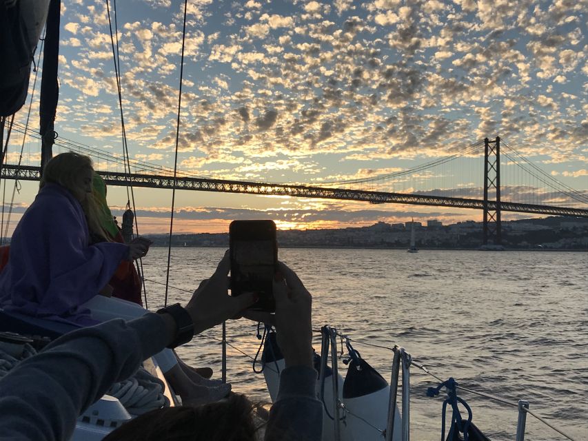 Lisbon: Sunset Sailing Cruise with Wine - The wine, snacks, and onboard atmosphere