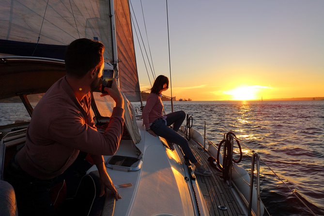 Lisbon Sunset Sailing Tour on Luxury Sailing Yacht with 2 Drinks - What the crew adds to the experience
