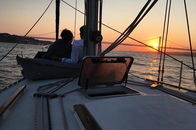 Lisbon Sunset Sailing Tour with White or Rosé Wine and Snacks - Riverside palaces and museums from the deck