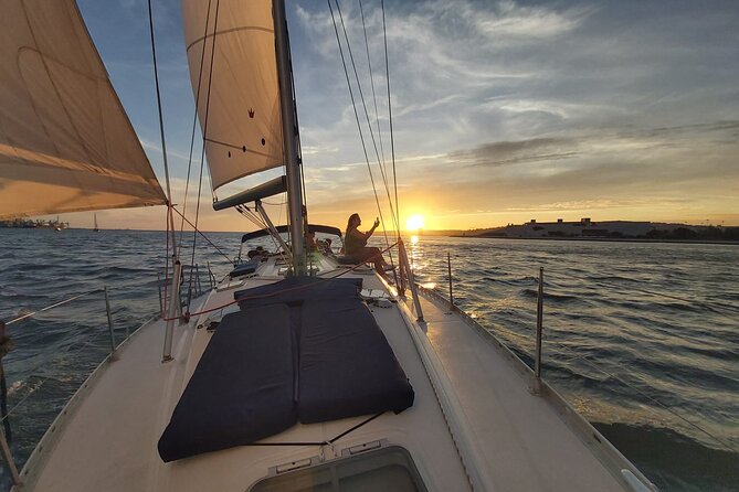 Lisbon: Sunset Sailing with Portuguese Wine and History - Cristo Rei and the wide river view