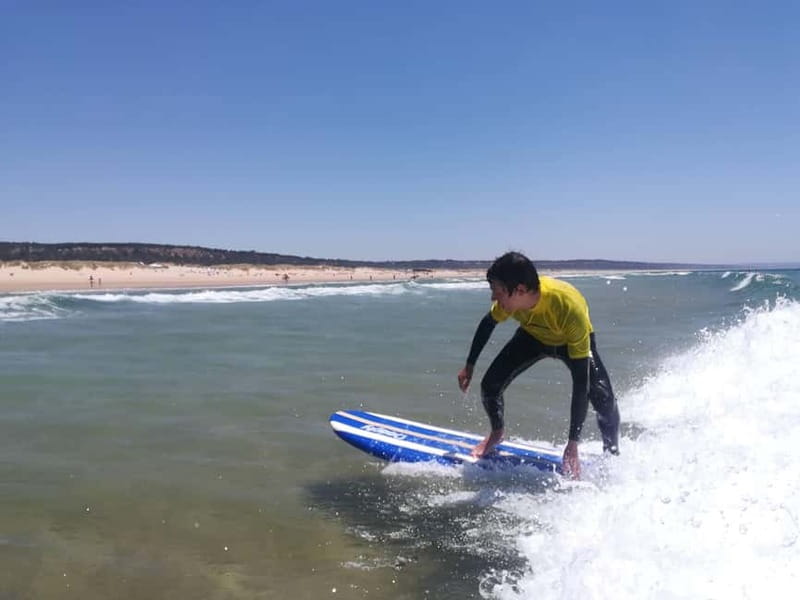 Lisbon: Surfing Lesson on Costa de Caparica Beach - Getting ready: wetsuit, board, and safety briefing