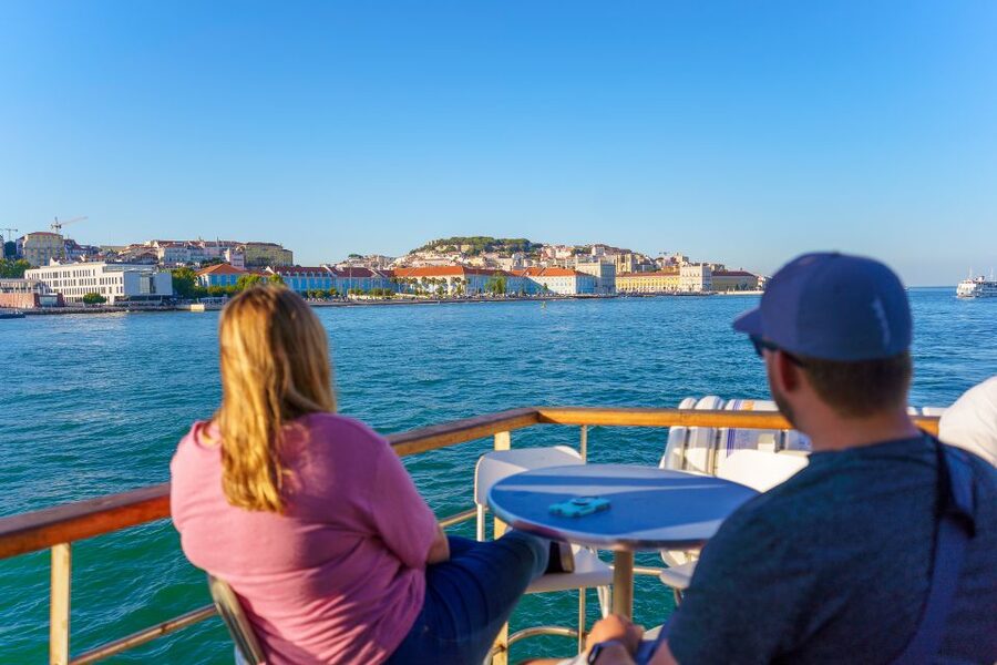 Lisbon: Tagus River Boat Tour with One Drink Included - Alfama from below