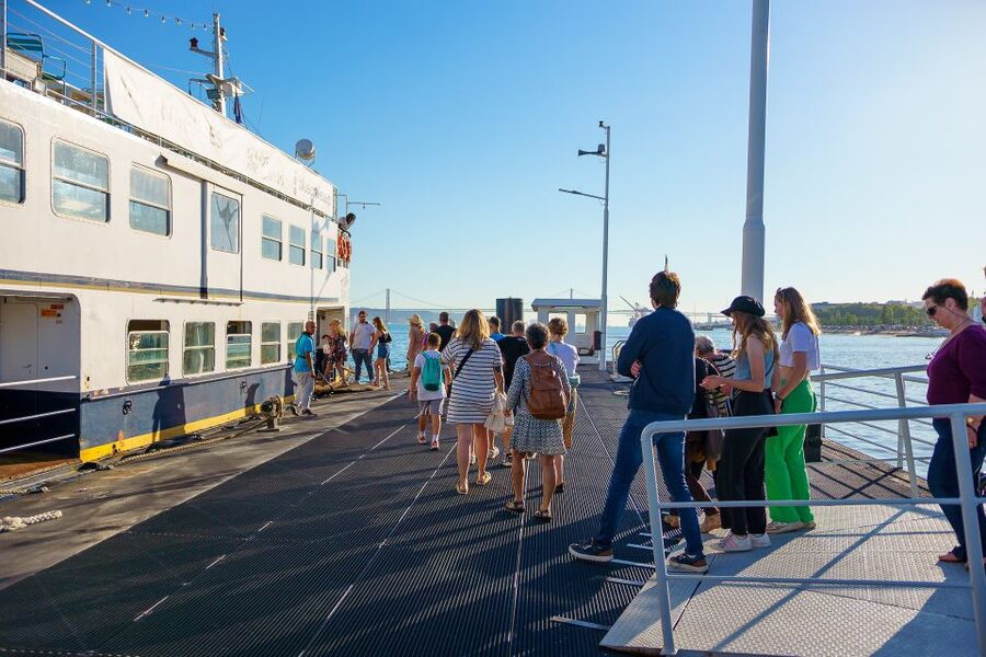 Lisbon: Tagus River Boat Tour with One Drink Included - The 25th of April Bridge overhead