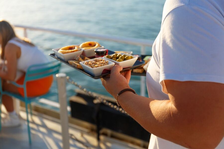 Lisbon: Tagus River Sunset Tour with Snacks and Drink - Christ the King and the wide river view