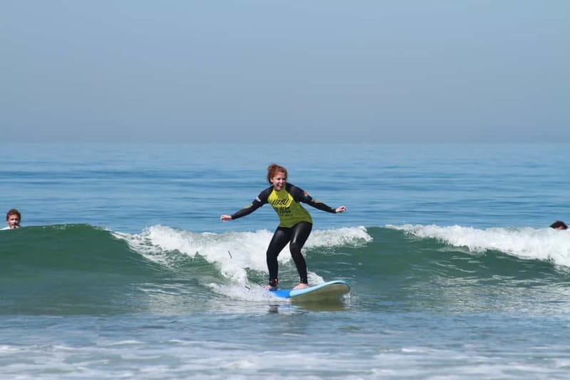 Lisbon: The Surf Instructor - surf lessons with transfer - From Lisbon streets to Praia do Castelo
