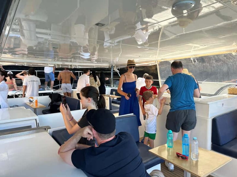 Portimão: Benagil Caves & Golden Coast Eco Catamaran Tour - Seasickness, clothing, and a smoother check-in