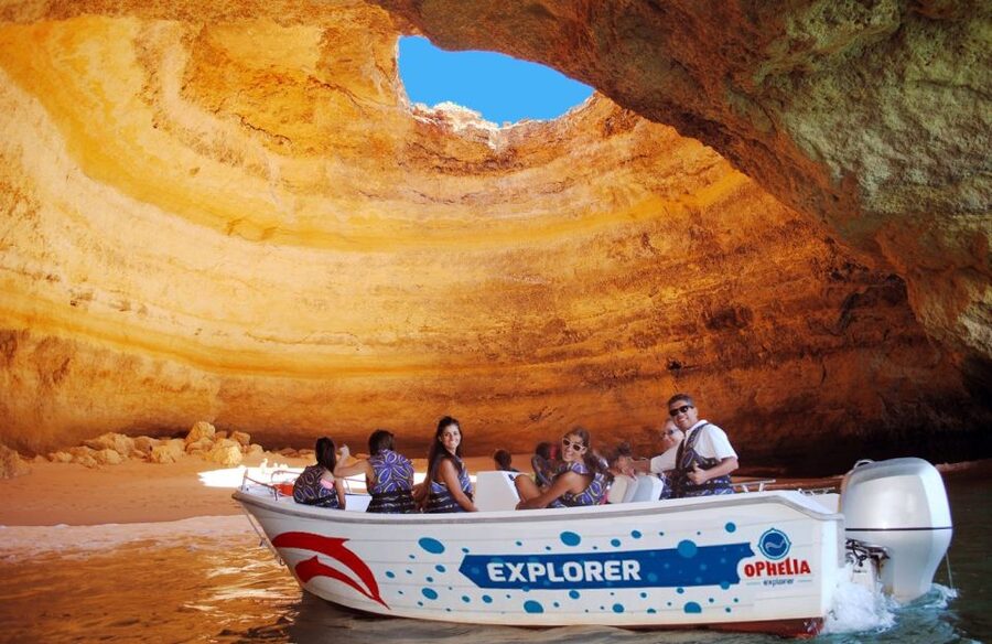 Portimão: Benagil Grottoes Boat Cruise - Cruising toward Carvoeiro by secluded beaches
