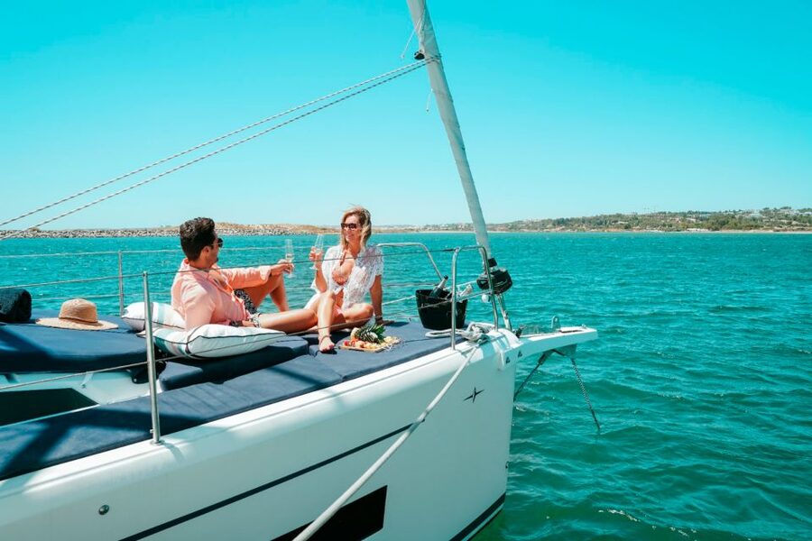 Portimao: Half-Day Sailing Yacht Cruise to the Benagil Caves - Swimming stops and two paddleboards