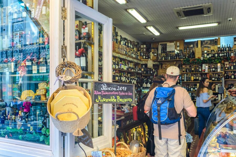 Porto: Delicious Food and Wine Walking Tour - Cheese, cured meats, olives, and sardines in local cafés