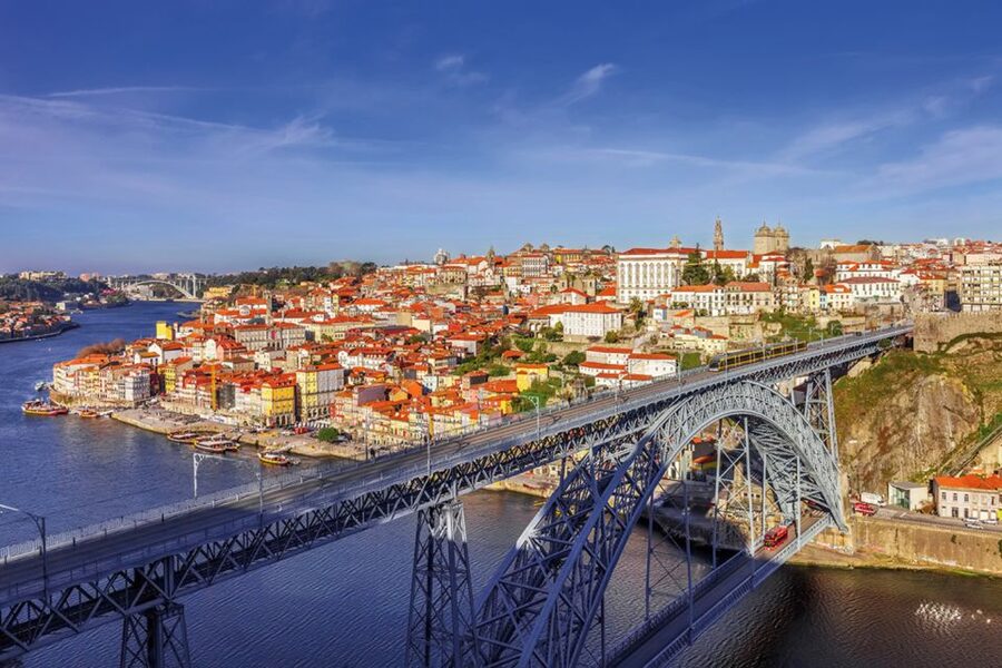 Porto Half-Day Tour and Wine Tasting - Walking through central Porto, with market and church stops