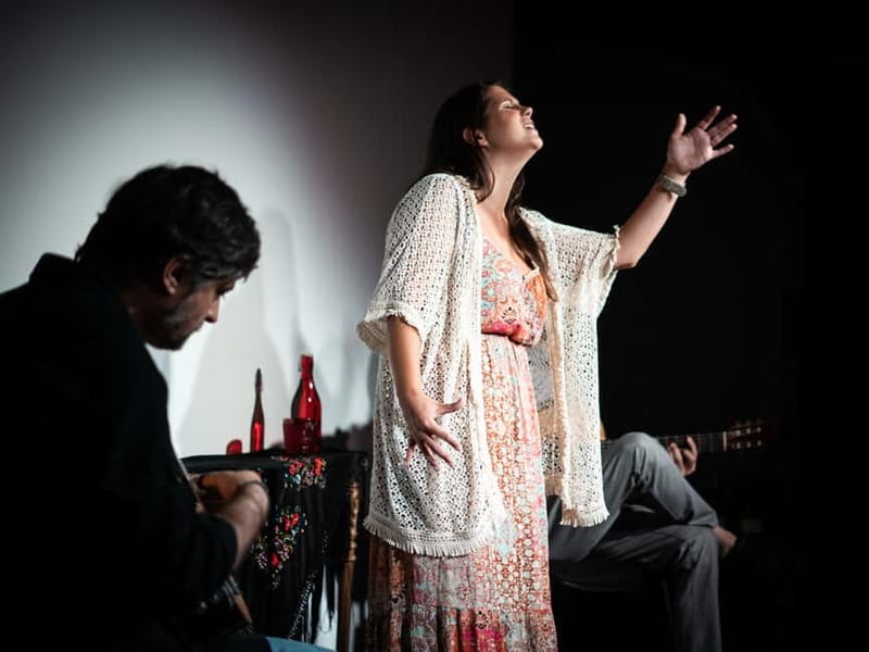 Porto: Live Fado Concert with Glass of Tawny Port Wine - Entering the Ribeira auditorium on Rua de São João