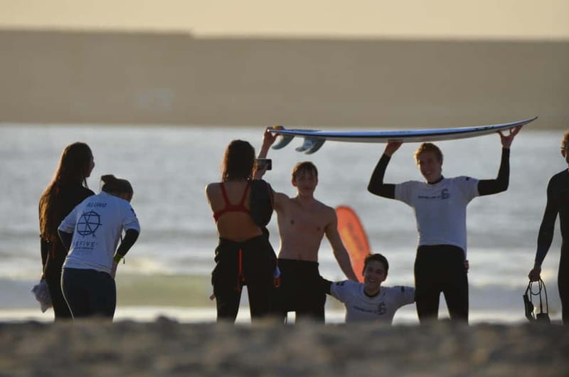 Porto: Surf Lesson with the First Surf School in Porto! - Getting into the Atlantic with the right equipment