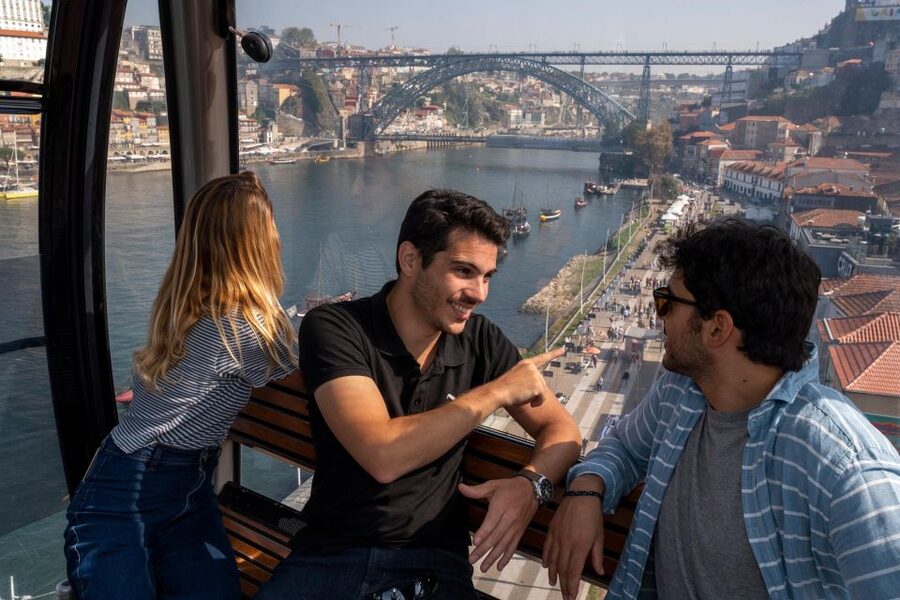 Porto: Walking Tour, Lello Bookshop, Boat and Cable Car - Crossing toward Dom Luís I Bridge