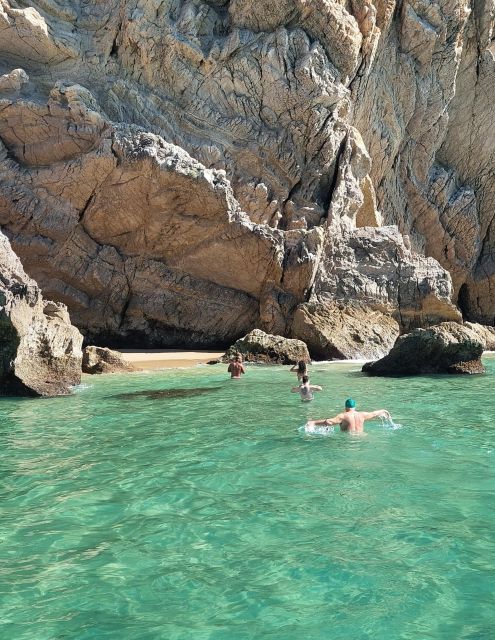 Sesimbra: Secret Bays and Beaches Boat Tour with Snorkeling - Baleeira Beach, the final longer stop