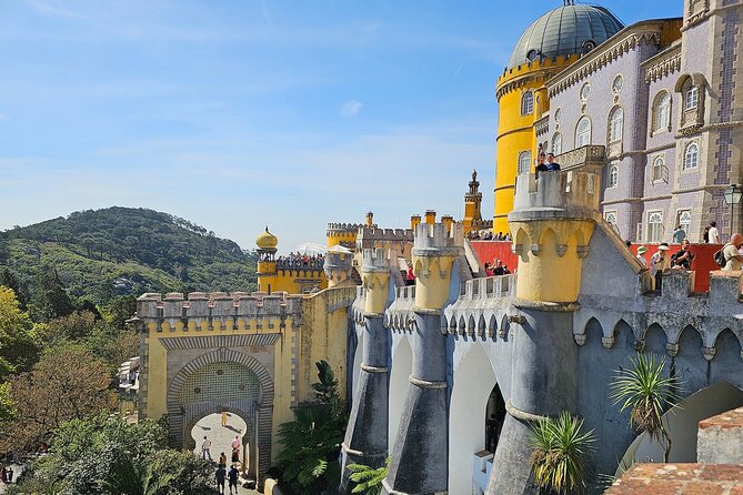 Sintra, Pena Palace, Quinta da Regaleira & Cascais Group Tour - Estoril on the ride back to Lisbon